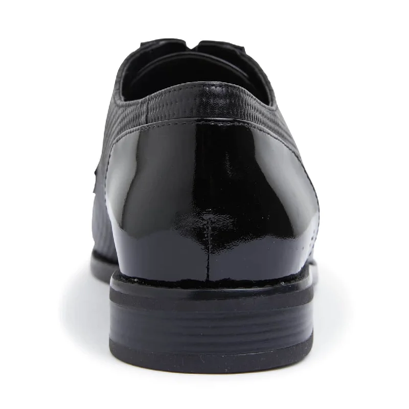 Panache Brogue in Black On Black Patent